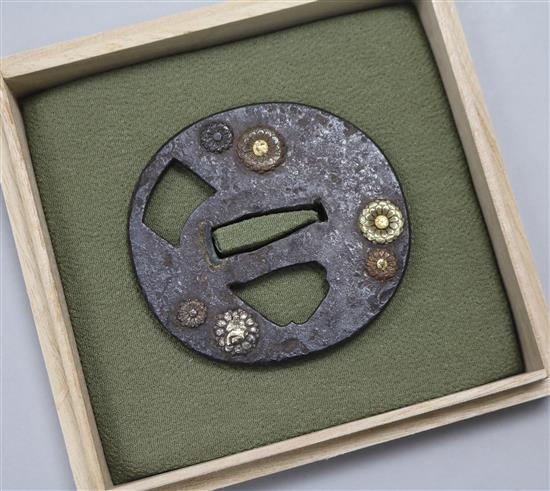 A Japanese bronze tsuba